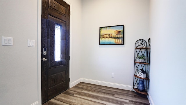 7436 Palisades Dr, Rowlett, TX 75088 - foyer entrance featuring dark wood-type flooring and baseboards
