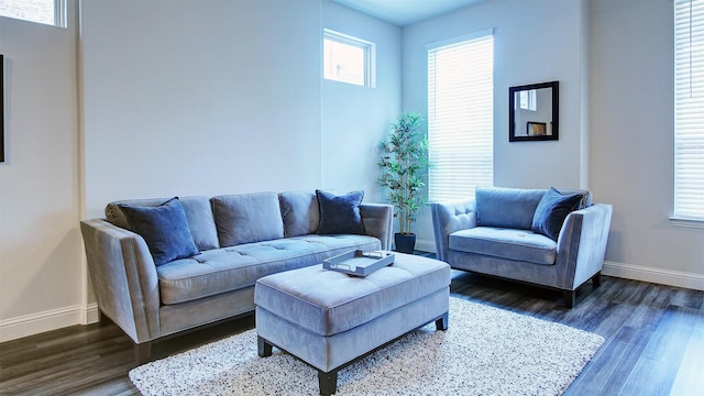 7436 Palisades Dr, Rowlett, TX 75088 - living room featuring baseboards and dark wood-style floors