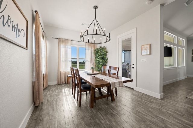 1196 Smith Rd, Ponder, TX 76259 - dining space featuring a chandelier, baseboards, and dark wood-style flooring