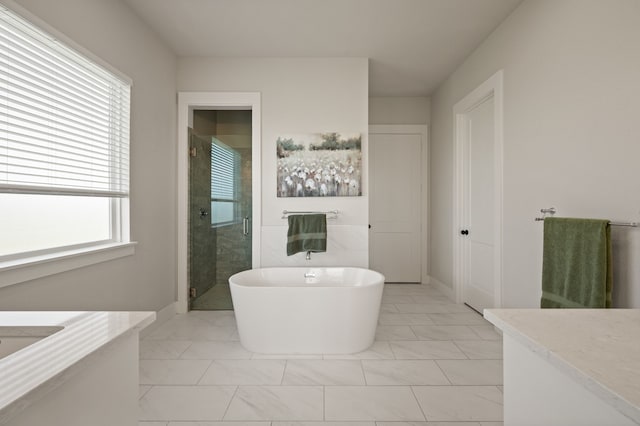 1196 Smith Rd, Ponder, TX 76259 - full bath featuring vanity, marble finish flooring, a stall shower, and a freestanding tub