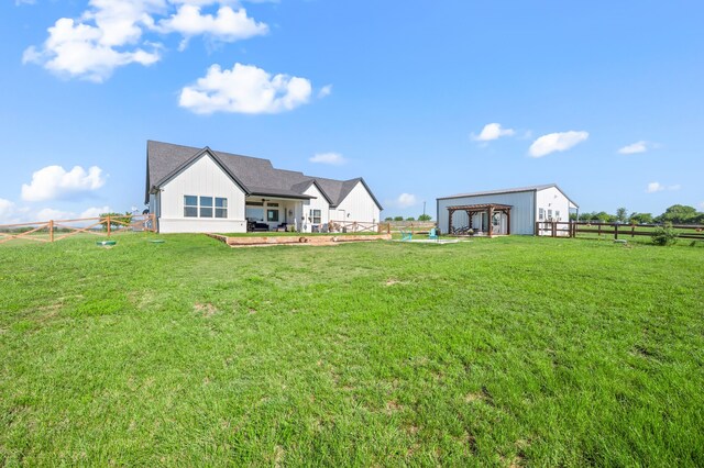 1196 Smith Rd, Ponder, TX 76259 - rear view of house featuring an outbuilding
