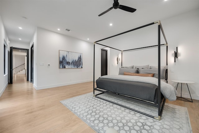 10026 Mccree Rd, Dallas, TX 75238 - bedroom with light wood-style floors, recessed lighting, baseboards, and ceiling fan