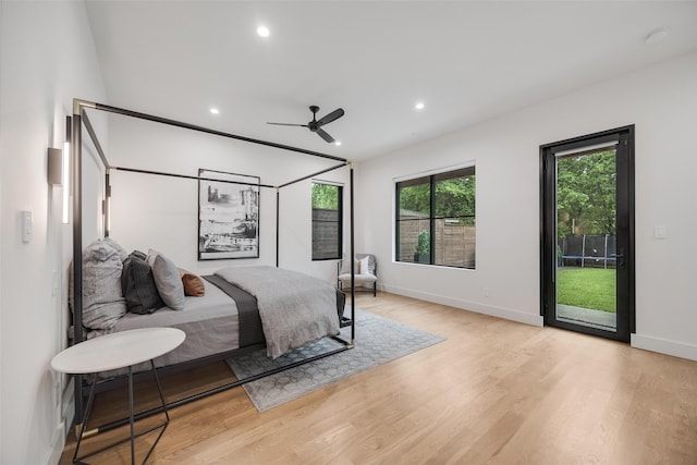 10026 Mccree Rd, Dallas, TX 75238 - bedroom featuring access to exterior, light wood-style flooring, recessed lighting, baseboards, and ceiling fan