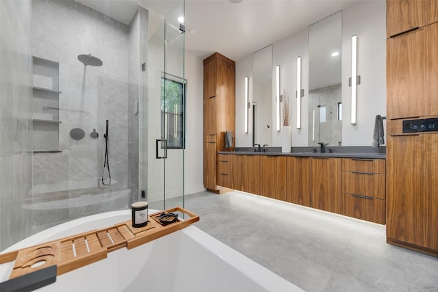 10026 Mccree Rd, Dallas, TX 75238 - full bath featuring a stall shower, a tub to relax in, and double vanity
