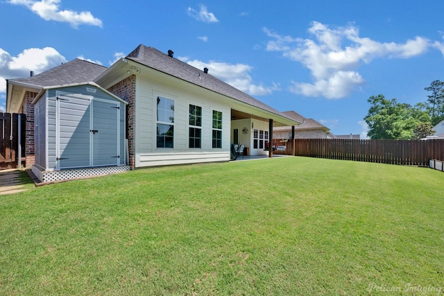 150 St Andrews Ln, Benton, LA 71006 - rear view of property featuring a shed, an outbuilding, roof with shingles, and brick siding