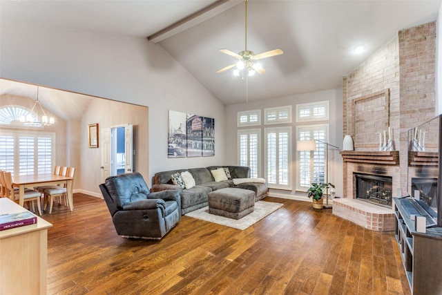 49 Sonora Dr, Trophy Club, TX 76262 - living room with a chandelier, a ceiling fan, hardwood / wood-style floors, plenty of natural light, and high vaulted ceiling