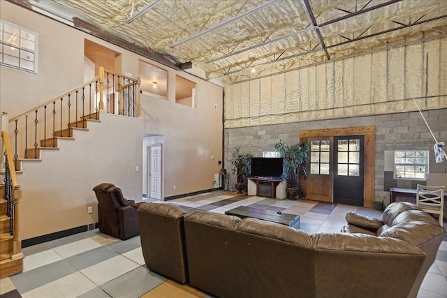 1474 Vz County Road 3810, Wills Point, TX 75169 - living room with a high ceiling, tile patterned floors, and stairway