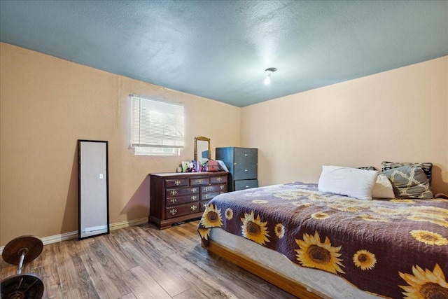 1474 Vz County Road 3810, Wills Point, TX 75169 - bedroom featuring wood finished floors and baseboards