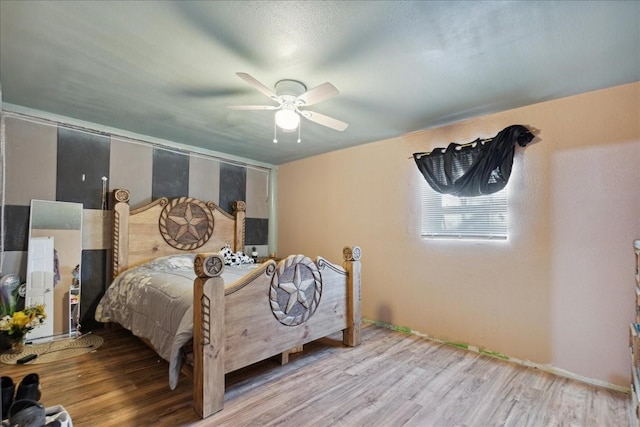 1474 Vz County Road 3810, Wills Point, TX 75169 - bedroom featuring wood finished floors and a ceiling fan