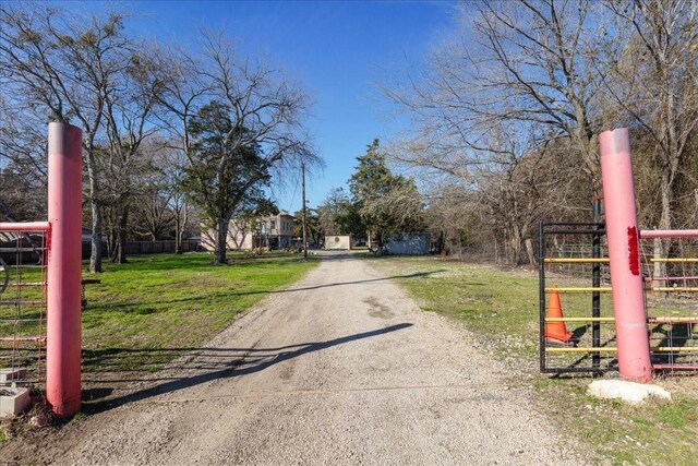 1474 Vz County Road 3810, Wills Point, TX 75169 - view of dirt / gravel road with a gated entry