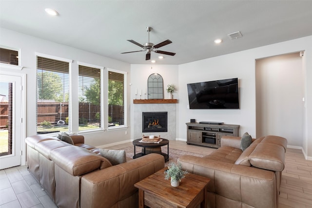 1106 Sassafras Dr, Princeton, TX 75407 - living area with a ceiling fan, recessed lighting, baseboards, and a tile fireplace
