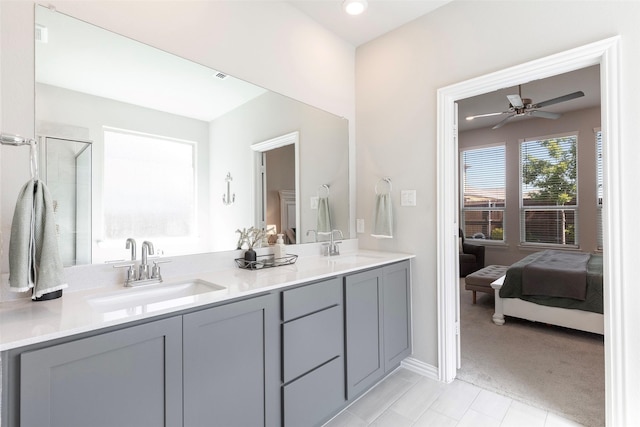 1106 Sassafras Dr, Princeton, TX 75407 - ensuite bathroom with double vanity, ceiling fan, a shower with shower door, baseboards, and recessed lighting