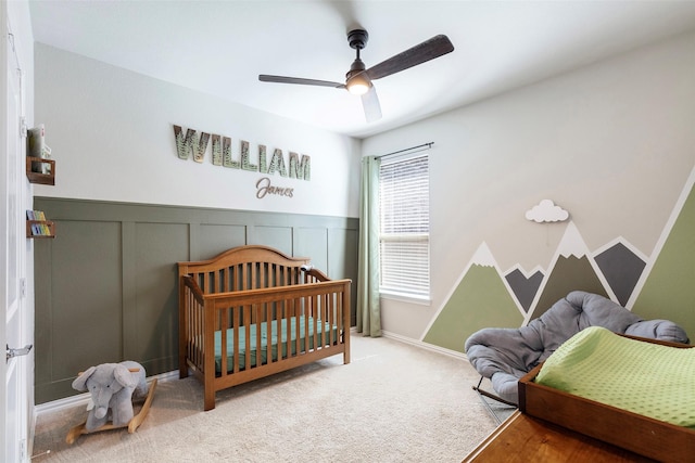 1106 Sassafras Dr, Princeton, TX 75407 - bedroom with a ceiling fan, carpet floors, and a wainscoted wall