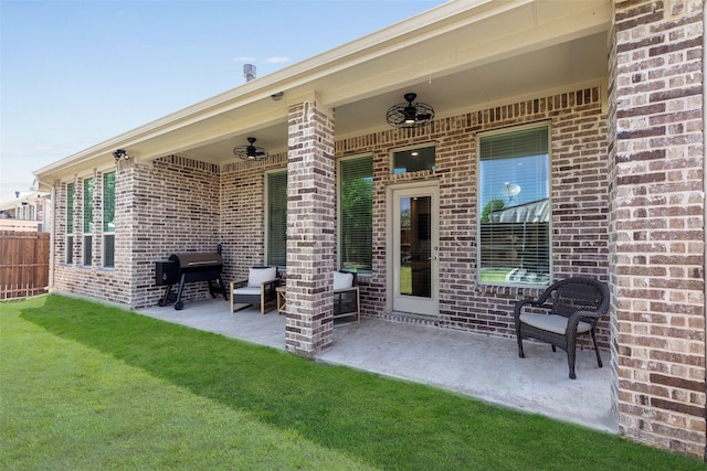 1106 Sassafras Dr, Princeton, TX 75407 - rear view of house with brick siding, a patio area, and a ceiling fan