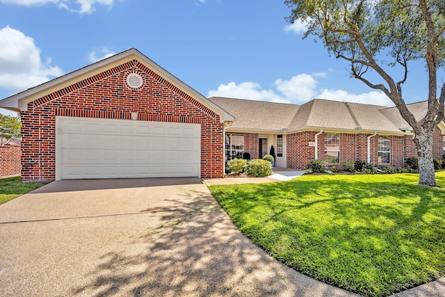 1521 Rice Rd Unit A101, Tyler, TX 75703 - view of front of home featuring brick siding, a front lawn, driveway, and an attached garage