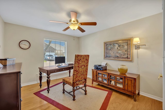 1521 Rice Rd Unit A101, Tyler, TX 75703 - office featuring a ceiling fan, light wood-type flooring, and baseboards