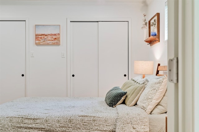bedroom featuring crown molding