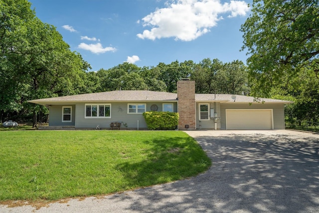 919 Old Justin Rd, Argyle, TX 76226 - ranch-style home featuring concrete driveway, a chimney, an attached garage, and a front yard