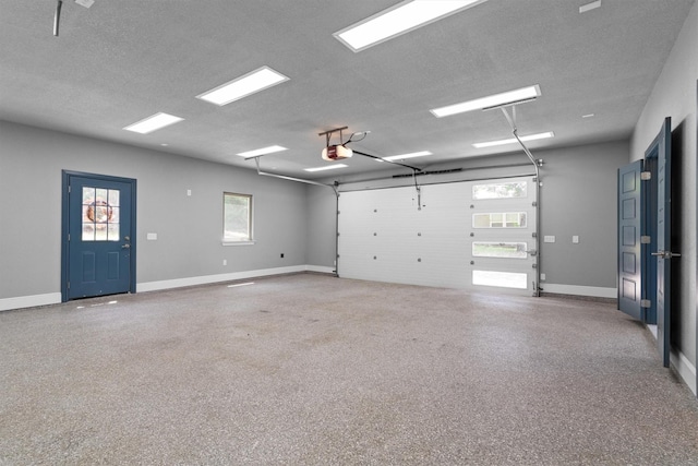919 Old Justin Rd, Argyle, TX 76226 - garage with a garage door opener and baseboards