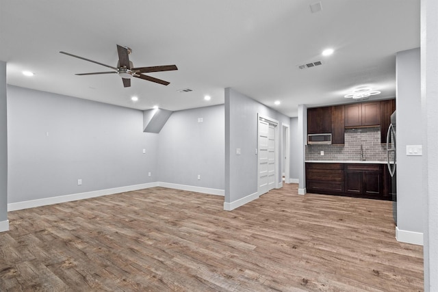 919 Old Justin Rd, Argyle, TX 76226 - interior space with light wood-type flooring, baseboards, a ceiling fan, and recessed lighting