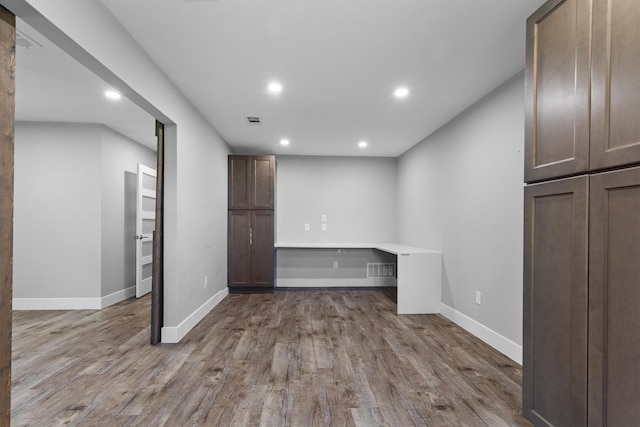 919 Old Justin Rd, Argyle, TX 76226 - below grade area featuring recessed lighting, wood finished floors, and baseboards