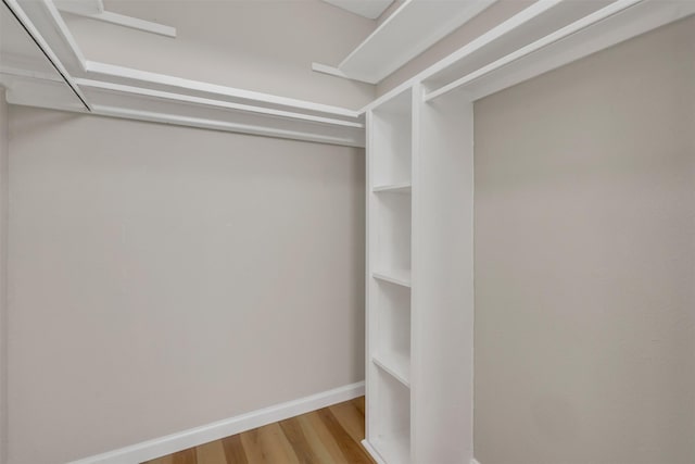 13788 Brookgreen Cir, Dallas, TX 75240 - spacious closet with wood finished floors