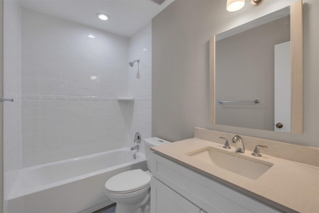 13788 Brookgreen Cir, Dallas, TX 75240 - bathroom featuring toilet, vanity, tub / shower combination, and recessed lighting