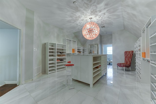 2621 Elmbrook Dr, Carrollton, TX 75010 - dining area featuring vaulted ceiling, a chandelier, and baseboards