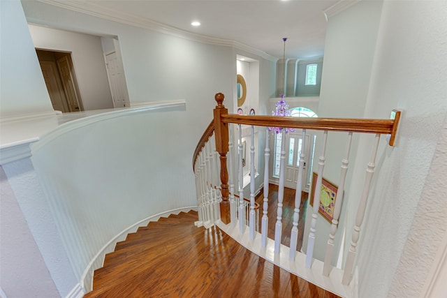 2621 Elmbrook Dr, Carrollton, TX 75010 - stairs featuring wood finished floors, crown molding, and recessed lighting