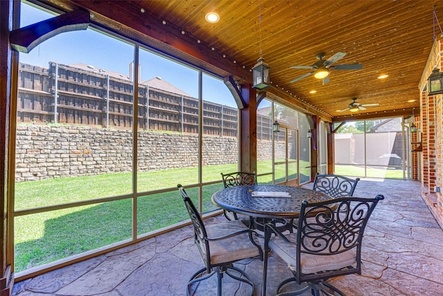 2621 Elmbrook Dr, Carrollton, TX 75010 - sunroom featuring a ceiling fan, healthy amount of natural light, and outdoor dining area
