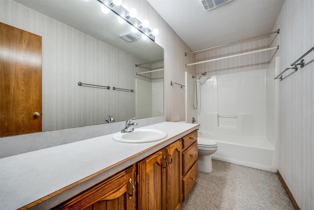 348 Indian Trl, Decatur, TX 76234 - full bathroom with vanity, toilet, wallpapered walls, washtub / shower combination, and a textured ceiling