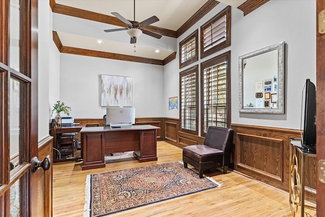 home office featuring crown molding, a wainscoted wall, light wood finished floors, a ceiling fan, and recessed lighting