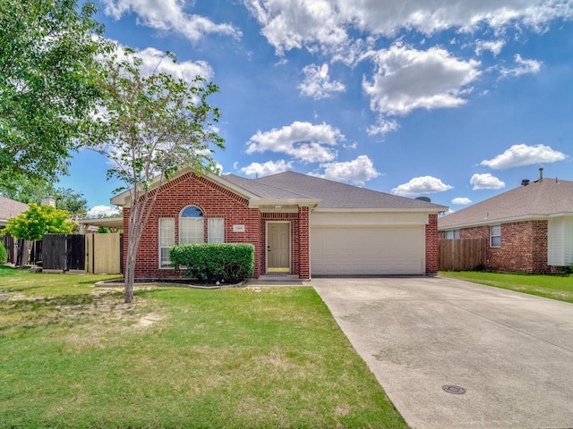 2500 Westheimer Rd, Denton, TX 76210 - view of front facade with brick siding, an attached garage, and concrete driveway