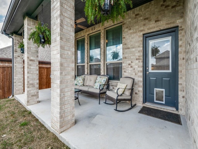 11724 Pistachio Trl, Fort Worth, TX 76108 - view of exterior entry with fence, brick siding, outdoor lounge area, and covered porch