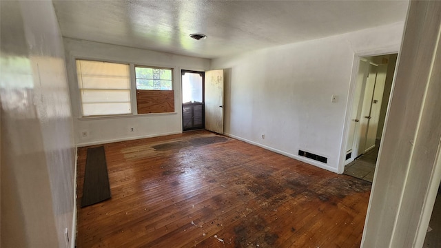 114 Wilmington Ave, Waxahachie, TX 75165 - unfurnished room featuring hardwood / wood-style flooring and baseboards