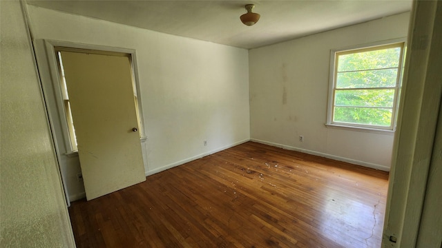 114 Wilmington Ave, Waxahachie, TX 75165 - spare room with hardwood / wood-style floors and baseboards