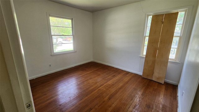 114 Wilmington Ave, Waxahachie, TX 75165 - spare room featuring hardwood / wood-style flooring and baseboards