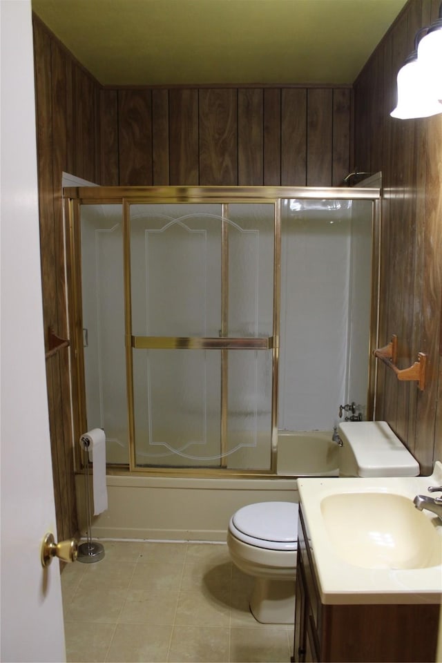 114 Wilmington Ave, Waxahachie, TX 75165 - full bath with toilet, tile patterned floors, enclosed tub / shower combo, and vanity
