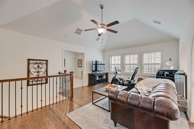 7320 San Saba Dr, Mckinney, TX 75070 - living area featuring wood finished floors, a ceiling fan, and high vaulted ceiling