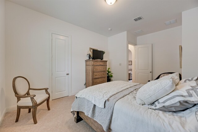 7320 San Saba Dr, Mckinney, TX 75070 - bedroom with light colored carpet and arched walkways