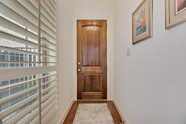 7320 San Saba Dr, Mckinney, TX 75070 - entryway with dark wood finished floors and baseboards