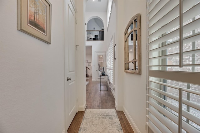 7320 San Saba Dr, Mckinney, TX 75070 - corridor with dark wood-type flooring and a high ceiling