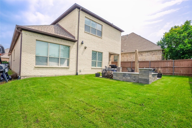 4804 Spicewood Ln, Arlington, TX 76017 - back of property featuring brick siding and a patio