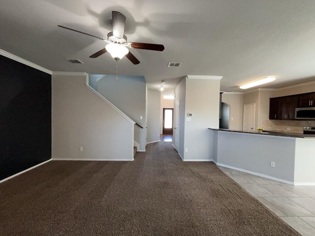 3000 Buckthorn St, Forney, TX 75126 - unfurnished living room with ceiling fan, crown molding, stairs, and baseboards