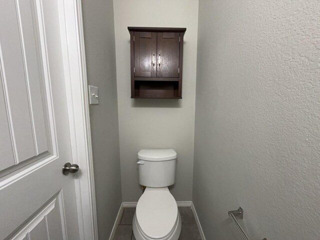 3000 Buckthorn St, Forney, TX 75126 - bathroom featuring baseboards and toilet