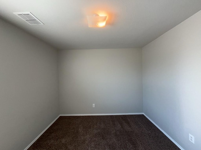 3000 Buckthorn St, Forney, TX 75126 - empty room featuring dark carpet and baseboards
