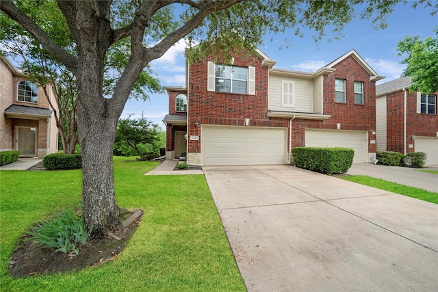 3421 Paisano Trl, Plano, TX 75093 - view of front of home with a garage, concrete driveway, a front yard, and brick siding