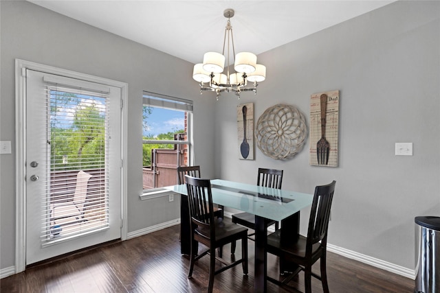 3421 Paisano Trl, Plano, TX 75093 - dining space with a chandelier, baseboards, and dark wood-style flooring