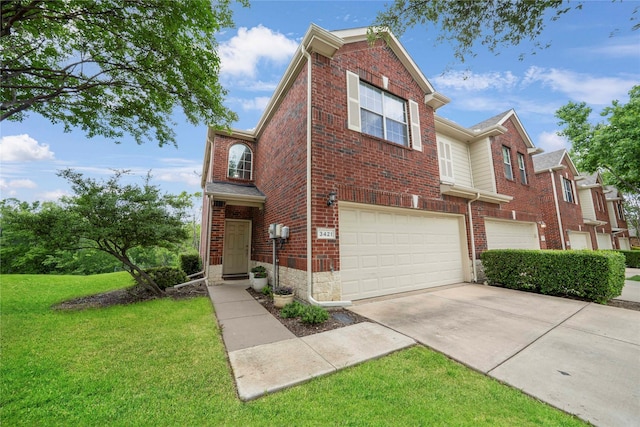 3421 Paisano Trl, Plano, TX 75093 - view of front facade with brick siding, an attached garage, driveway, and a front lawn