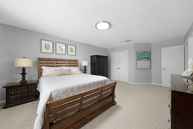 3421 Paisano Trl, Plano, TX 75093 - bedroom featuring light colored carpet, baseboards, and a closet